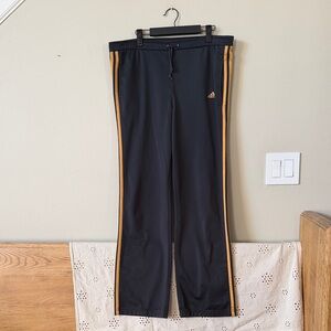 Adidas Black Track Pants with Gold Accents